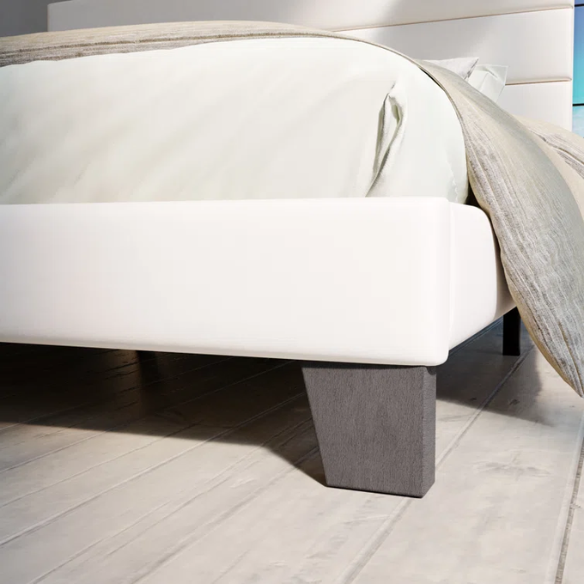 White upholstered queen platform bed with tufted headboard and wood slat base, no box spring required