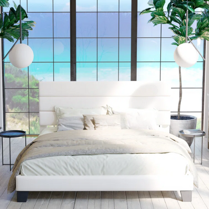 White upholstered queen platform bed with tufted headboard and wood slat base, no box spring required