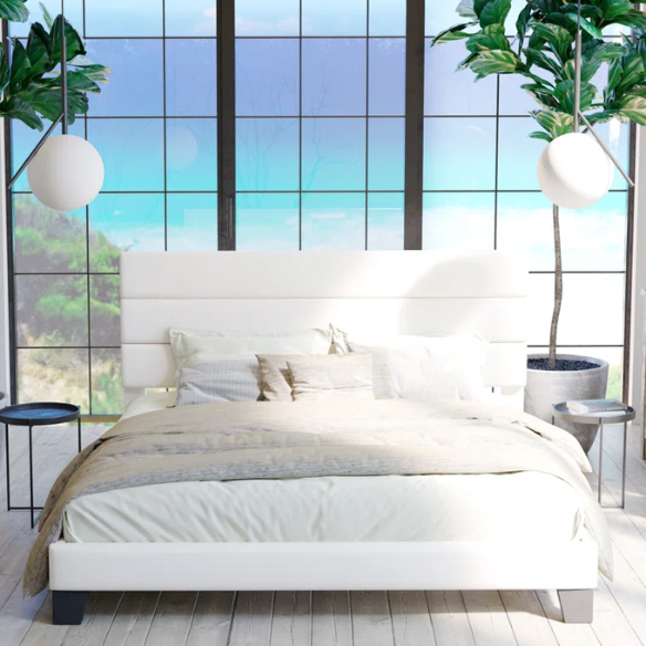 White upholstered queen platform bed with tufted headboard and wood slat base, no box spring required