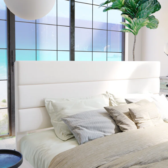White upholstered queen platform bed with tufted headboard and wood slat base, no box spring required