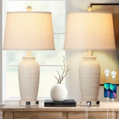 Set of two beige clay pot-style table lamps with white drum fabric shades, featuring touch control dimming, USB, Type-C, and AC charging ports

