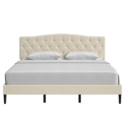 Beige king-size upholstered platform bed with camelback tufted headboard, foam padding, and low-profile wood frame with underbed clearance

