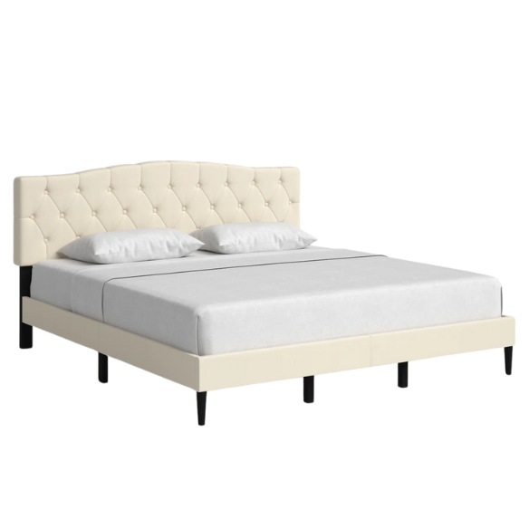 Beige king-size upholstered platform bed with camelback tufted headboard, foam padding, and low-profile wood frame with underbed clearance

