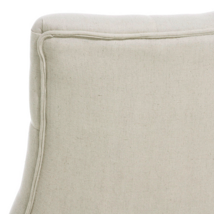 Set of four beige upholstered dining chairs featuring diamond tufting, armless design, sloped sides, and espresso brown wooden legs.