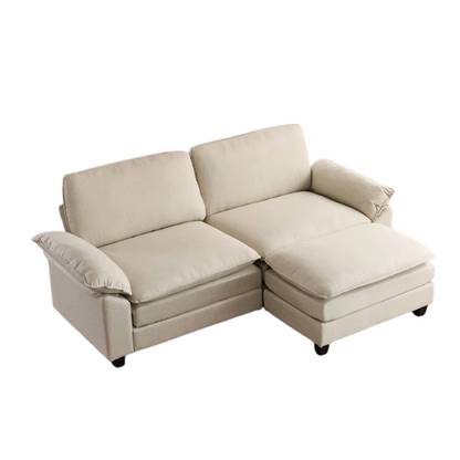 Beige modular cloud sofa with pillow top arms, deep foam cushions, and matching ottoman