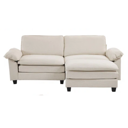 Beige modular cloud sofa with pillow top arms, deep foam cushions, and matching ottoman