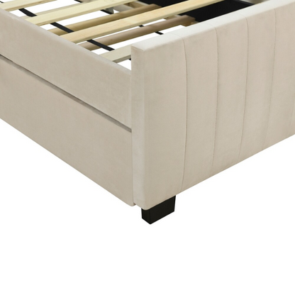 Beige twin upholstered platform bed with tufted velvet headboard and pull-out trundle, ideal for kids, teens, or guest rooms, in a soft neutral finish and space-saving design.


