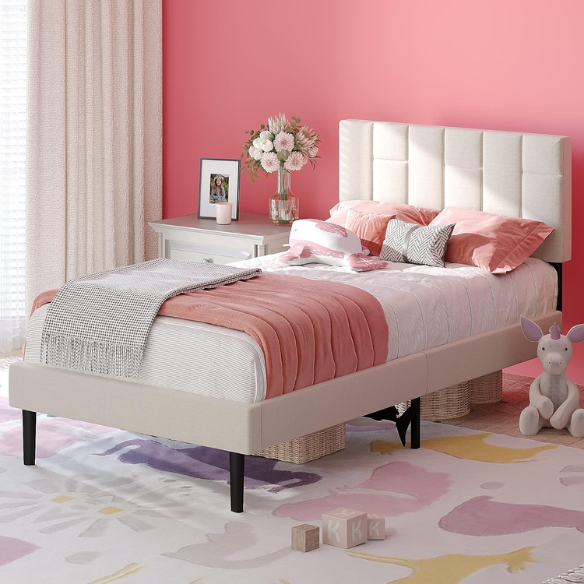 Beige twin platform bed frame with linen upholstered adjustable headboard, sturdy wooden slats, metal support frame, and underbed storage clearance.

