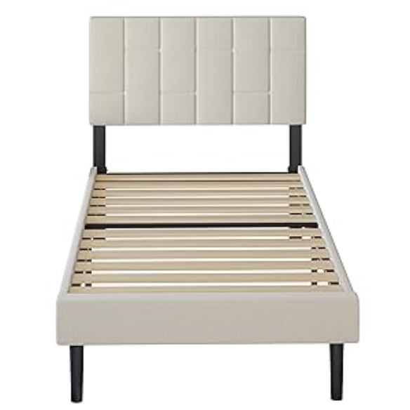Beige twin platform bed frame with linen upholstered adjustable headboard, sturdy wooden slats, metal support frame, and underbed storage clearance.

