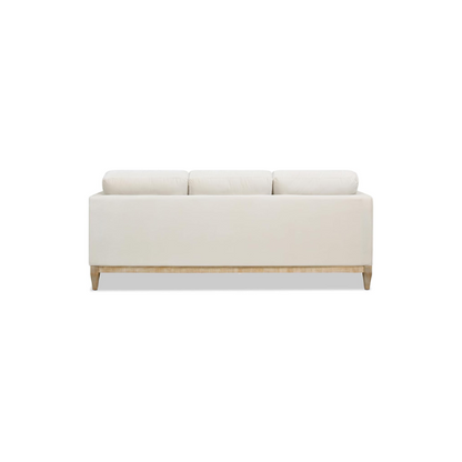 Beige velvet 3-seater sofa with square track arms, feather-down cushions, and natural wood legs, ideal for modern and transitional living rooms.


