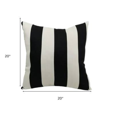 Striped accent pillow in black and cream – weather-resistant and reversible with plush polyester fill, ideal for indoor or outdoor use on patios, decks, or sofas.

