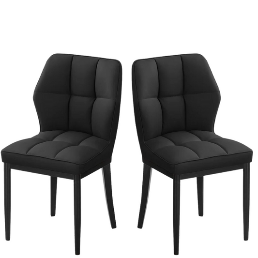 Set of two mid-century modern black faux leather dining chairs with checkered stitching and metal legs