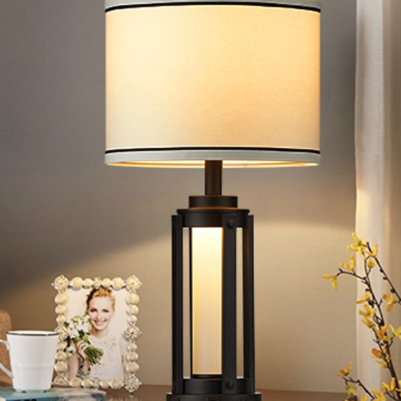 Set of two 25.3-inch modern black table lamps featuring white drum shades with black trim, built-in nightlight, USB and Type-C charging ports, and AC outlet on each base.

