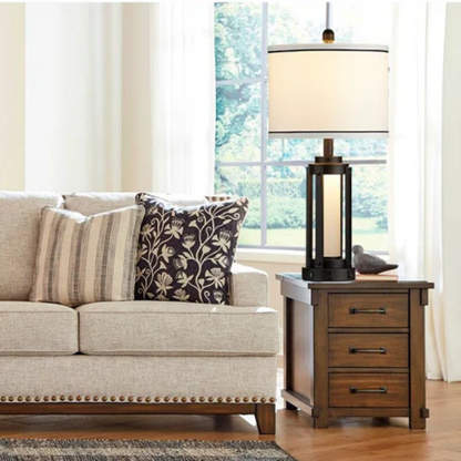 Set of two 25.3-inch modern black table lamps featuring white drum shades with black trim, built-in nightlight, USB and Type-C charging ports, and AC outlet on each base.


