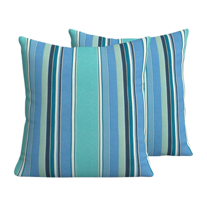 Blue, teal, and white striped accent pillow – reversible, weather-resistant, and overstuffed for comfort; perfect for indoor or outdoor use on patios, decks, or living spaces.

