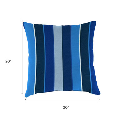 Blue and white striped accent pillow – reversible, weather-resistant, and overstuffed for stylish comfort indoors or outdoors on patios, decks, or sofas.

