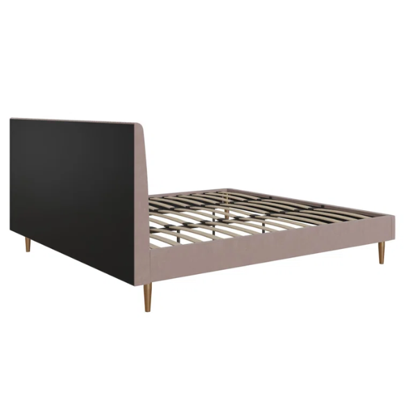 Blush pink velvet upholstered king-size platform bed with padded rectangular headboard, solid wood slats, and elegant low-profile frame.

