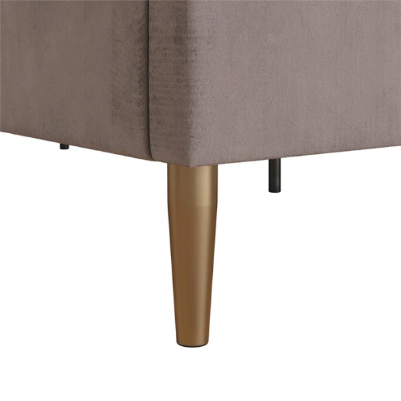 Blush pink velvet upholstered king-size platform bed with padded rectangular headboard, solid wood slats, and elegant low-profile frame.

