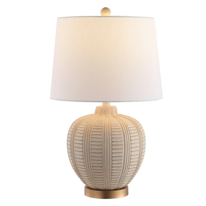 Cream and rose gold resin table lamp with carved textured base, white cotton drum shade, and built-in USB charging port for modern boho interiors

