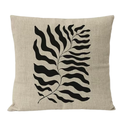 Boho linen throw pillow covers in black, light coffee, and cream with modern abstract design and leaf geometric print