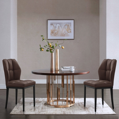 Set of two brown mid-century modern faux leather dining chairs with checkered stitching and metal legs