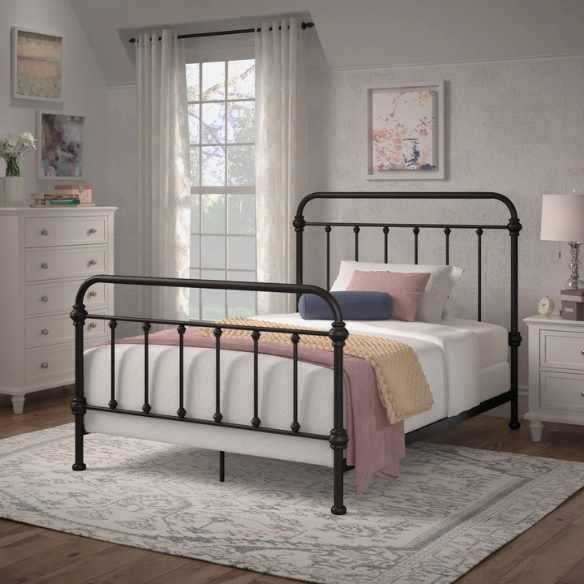Brown full size metal bed frame with curved headboard and footboard, spindle detailing, and center support legs