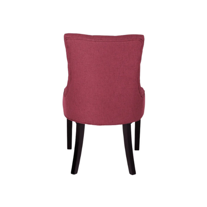 Set of four burgundy upholstered dining chairs featuring diamond tufted backs, armless design, sloped arms, and espresso brown wooden legs.

