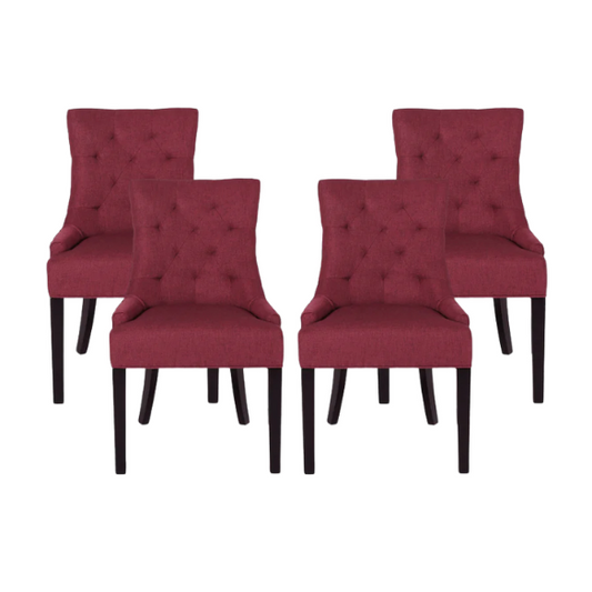 Set of four burgundy upholstered dining chairs featuring diamond tufted backs, armless design, sloped arms, and espresso brown wooden legs.

