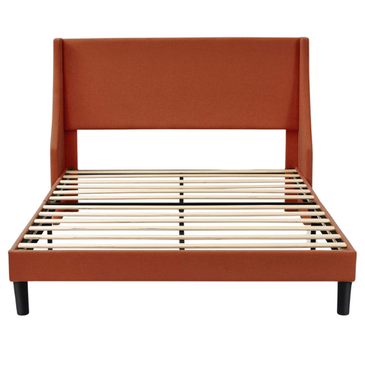 Burnt orange upholstered queen platform bed with wingback headboard, tapered legs, and slatted base – no box spring required

