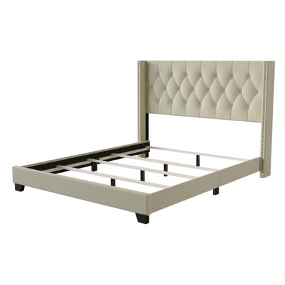 Buttercup yellow linen full size upholstered bed with button-tufted wingback headboard, nailhead trim, and low-profile frame.