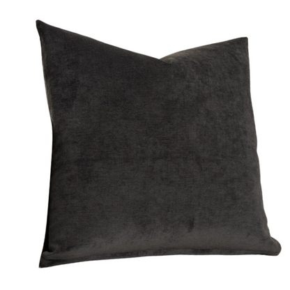 Charcoal crushed velvet throw pillow, 16x16 square design with soft texture and reversible fabric, styled on a modern sofa for cozy, luxurious home decor.

