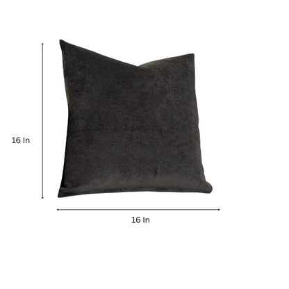 Charcoal crushed velvet throw pillow, 16x16 square design with soft texture and reversible fabric, styled on a modern sofa for cozy, luxurious home decor.

