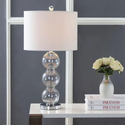 Set of 2 clear glass table lamps with triple-sphere design, polished silver accents, and white linen drum shades – elegant lighting for bedroom, living room, or office

