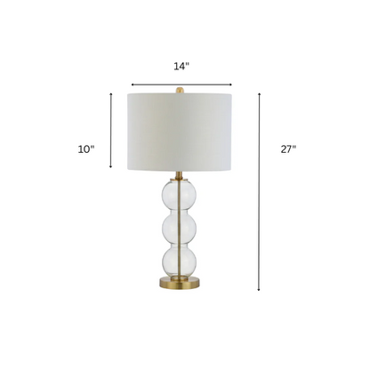 Set of 2 contemporary table lamps with clear glass triple-sphere base, gold accents, and white linen drum shade – modern glam bedside or living room lighting

