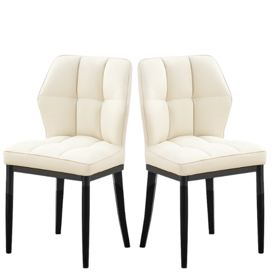 Set of two cream mid-century modern faux leather dining chairs with checkered stitching and metal legs