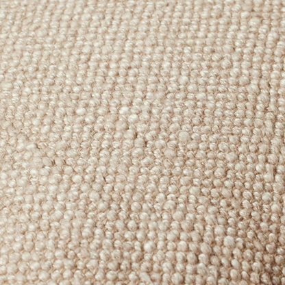 Cream cotton blend throw pillow with fringe, 22x22 square cushion, styled on a modern sofa for soft, neutral home decor.

