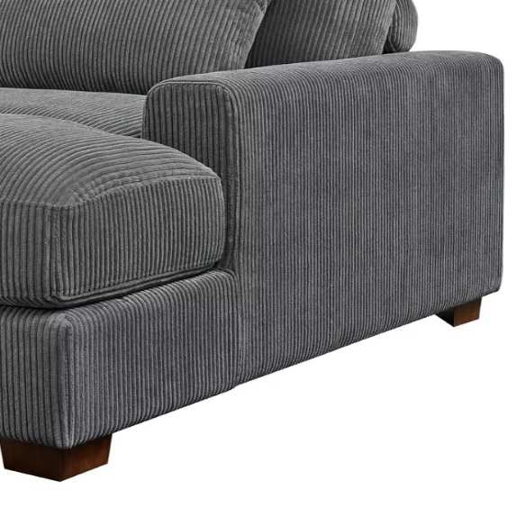 Dark grey corduroy convertible sleeper sofa with adjustable headrest, twin bed functionality, and mid-century modern wood legs