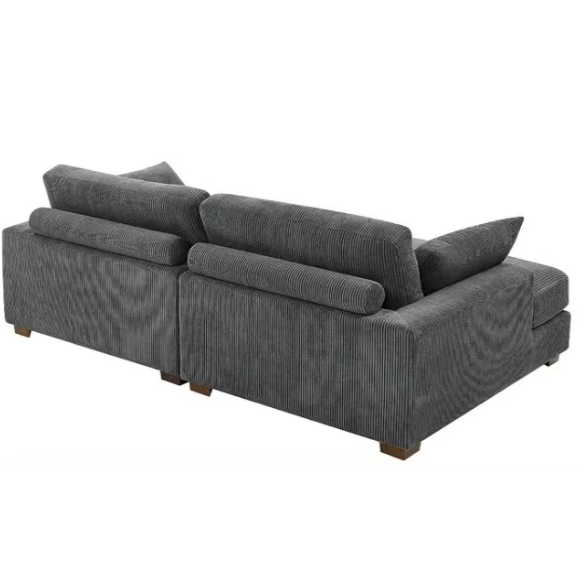 Dark grey corduroy convertible sleeper sofa with adjustable headrest, twin bed functionality, and mid-century modern wood legs