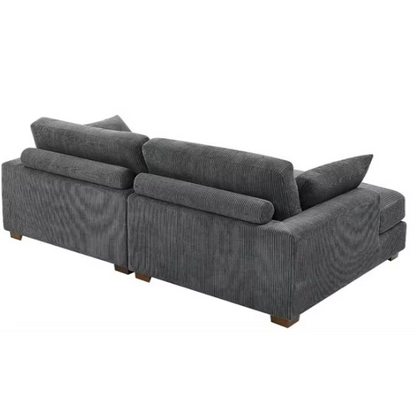 Dark grey corduroy convertible sleeper sofa with adjustable headrest, twin bed functionality, and mid-century modern wood legs