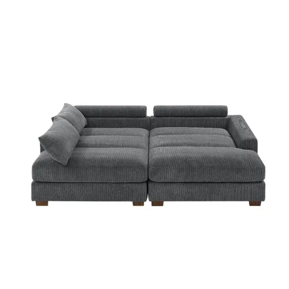 Dark grey corduroy convertible sleeper sofa with adjustable headrest, twin bed functionality, and mid-century modern wood legs