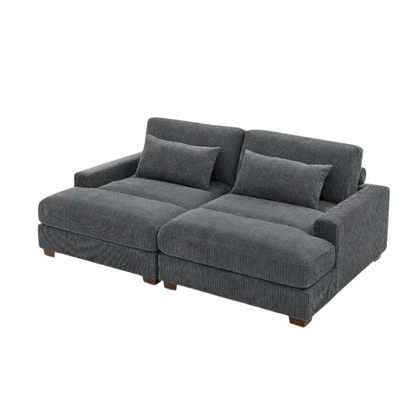 Dark grey corduroy convertible sleeper sofa with adjustable headrest, twin bed functionality, and mid-century modern wood legs
