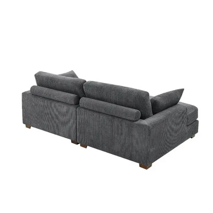 Dark grey corduroy convertible sleeper sofa with adjustable headrest, twin bed functionality, and mid-century modern wood legs