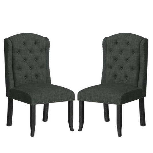 Set of two dark grey wingback farmhouse dining chairs with tufted backs, brass nailhead trim, and espresso-finished wooden legs

