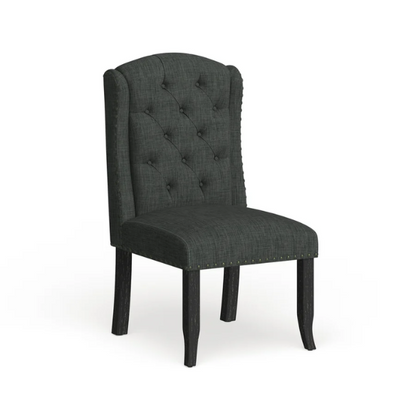 Set of two dark grey wingback farmhouse dining chairs with tufted backs, brass nailhead trim, and espresso-finished wooden legs

