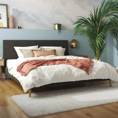Dark grey linen upholstered king-size platform bed with rectangular headboard, wood slats, and no box spring required.

