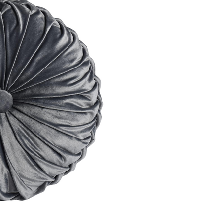 Dark grey velvet round throw pillows with hand-pleated design and button center, set of two 14.5-inch plush cushions styled in a modern living space.

