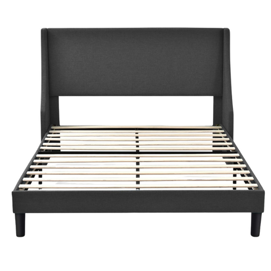 Dark grey upholstered queen platform bed with wingback headboard, slatted base, and black tapered legs – no box spring required


