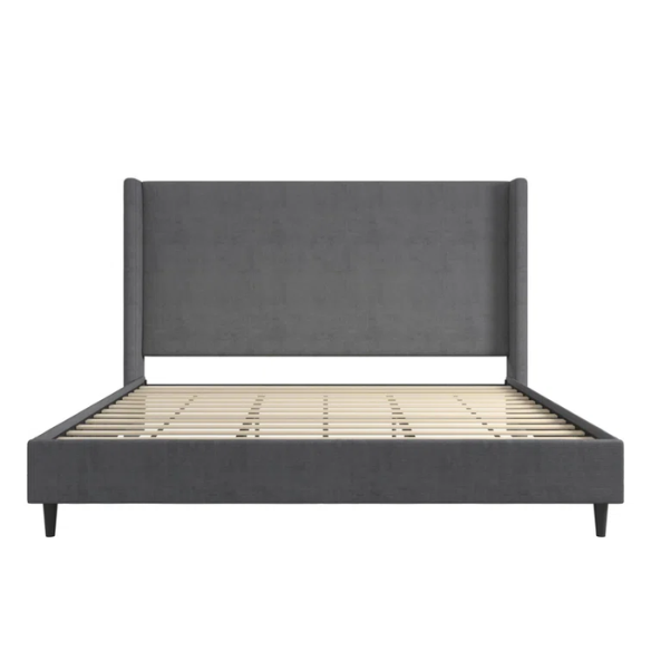 Dark grey soft woven upholstered king platform bed with tall wingback headboard and sturdy slat support.

