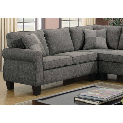 Dark grey transitional L-shaped sectional sofa with rolled arms, welt-trimmed cushions, and checkerboard accent pillows
