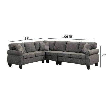 Dark grey transitional L-shaped sectional sofa with rolled arms, welt-trimmed cushions, and checkerboard accent pillows